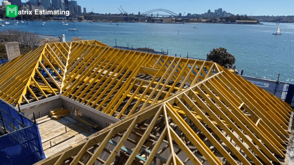 Construction framework of yellow steel beams at a building site