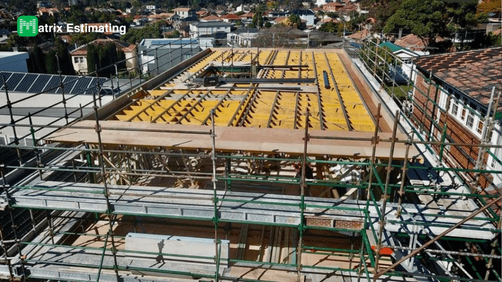 Modern construction site with yellow framework and solar panels